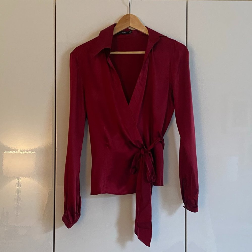 Red silk wrap around long sleeved blouse